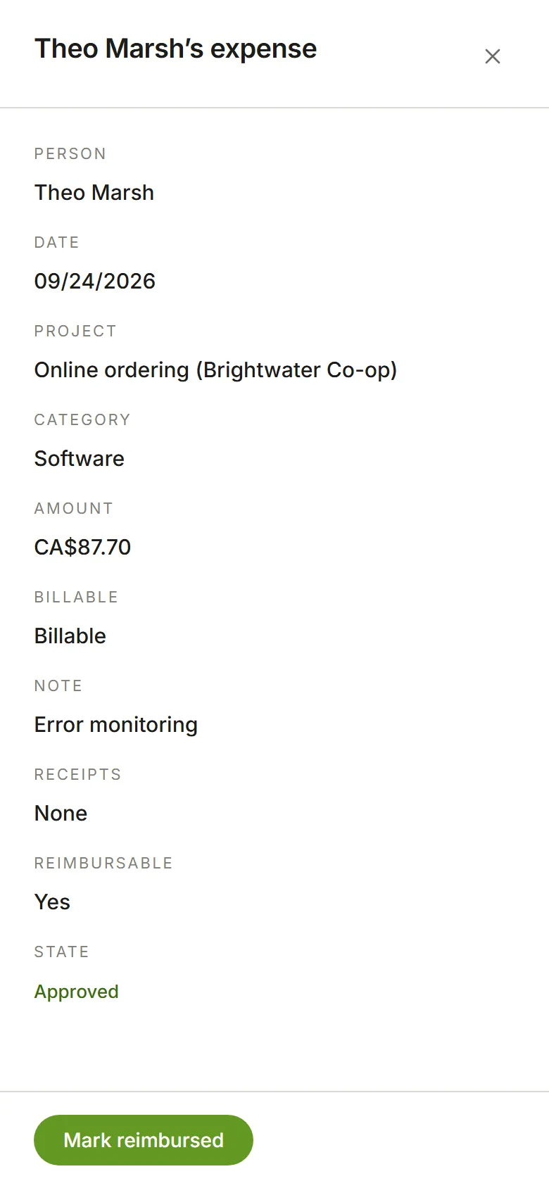 An approved expense the person paid for, with Mark reimbursed